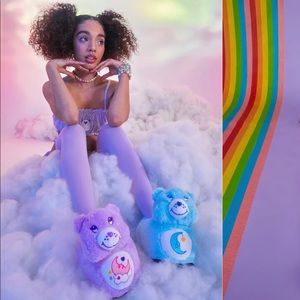 Beautiful doll kills Carebear slippers brand new never used